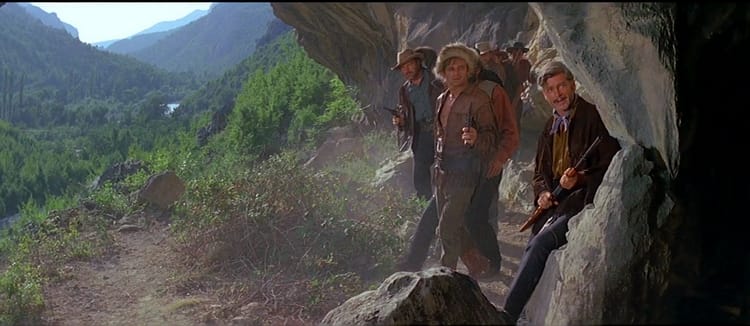 Forrester et sa bande en train de s'emparer de la grotte des Assiniboins